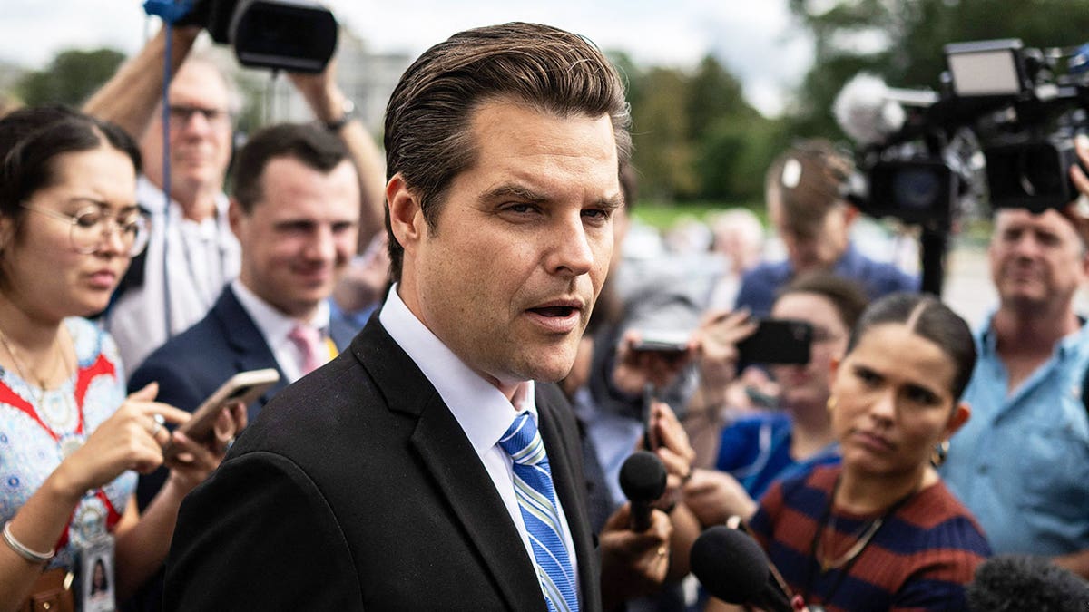 Matt Gaetz, R-Fla., surrounded by reporters