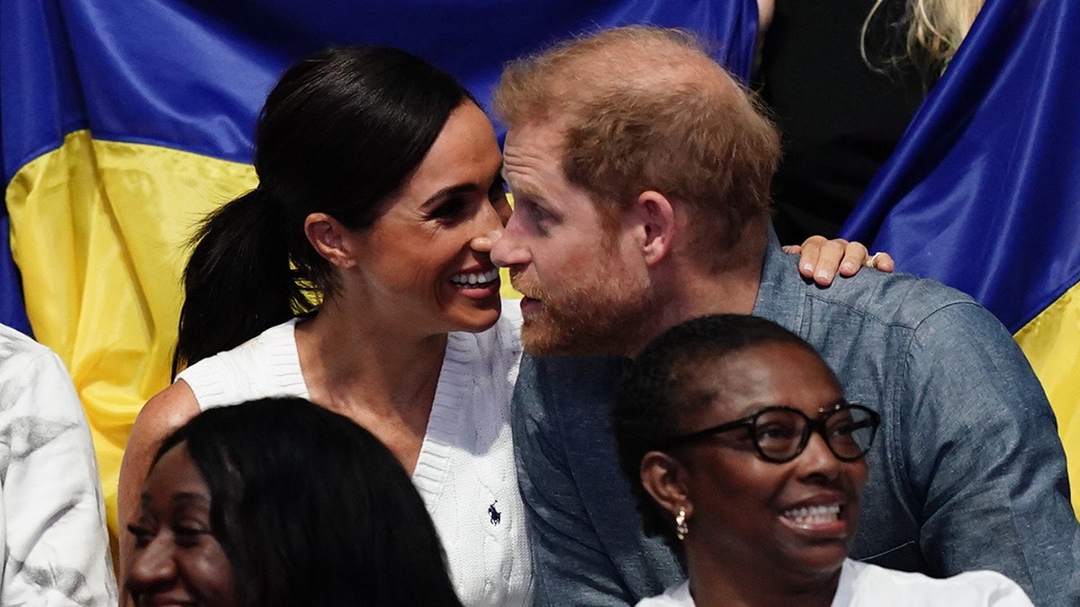 Prince Harry, Meghan Markle pack on PDA as they celebrate duke's 