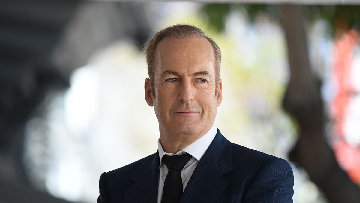 Actor Bob Odenkirk standing and smiling