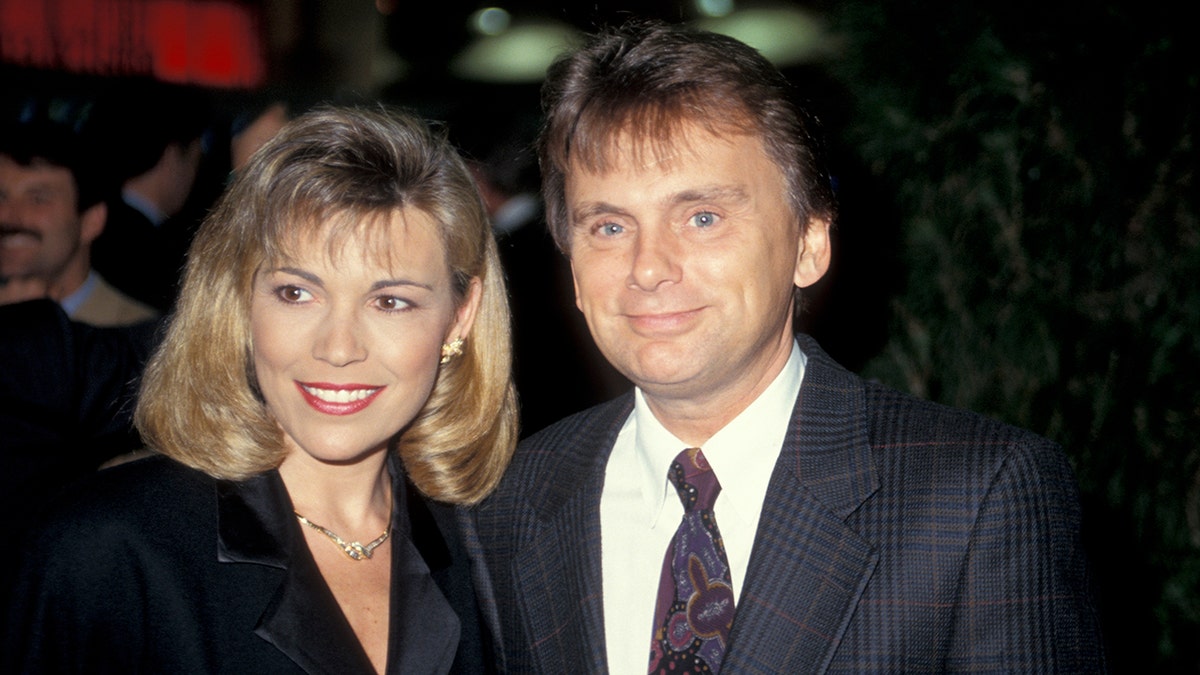 Vanna White and Pat Sajak smiling together