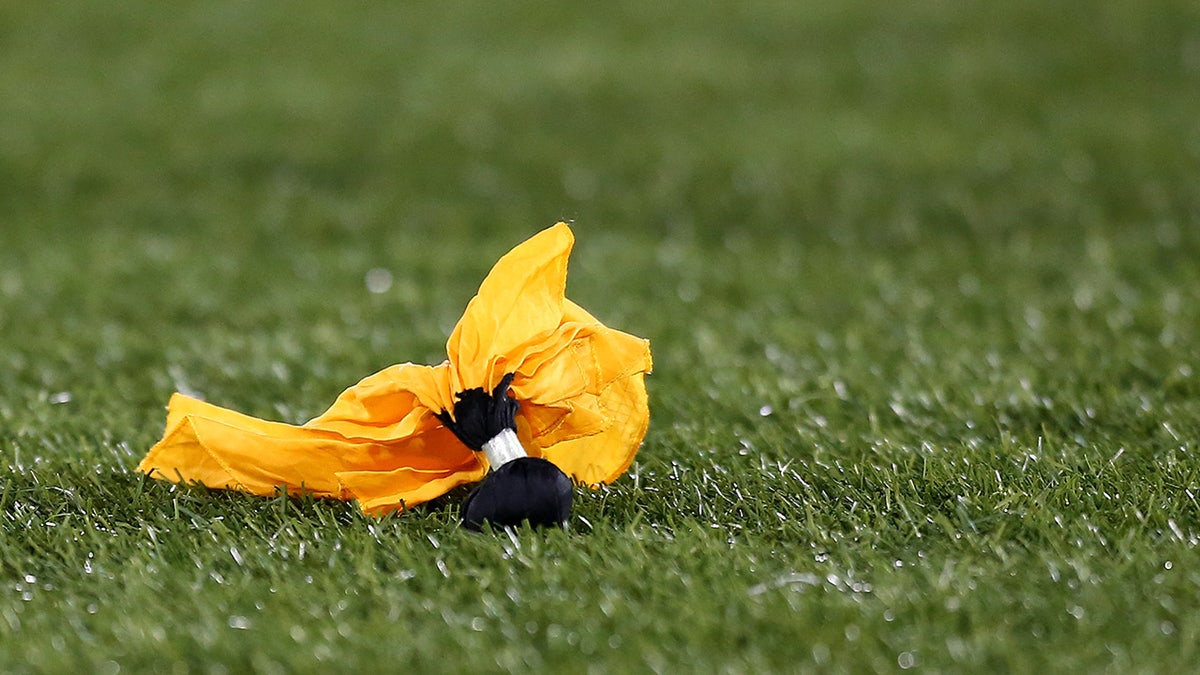A penalty flag on the turf