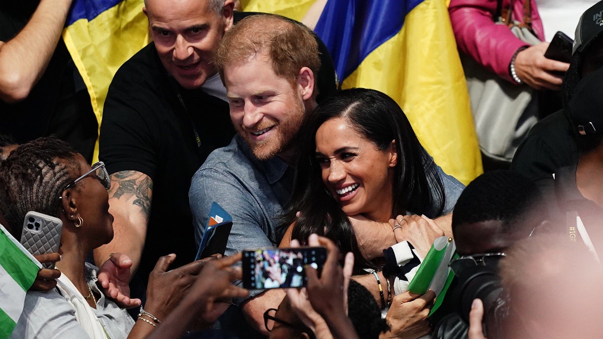 Prince Harry and Meghan Markle watch volleyball at Invictus Games