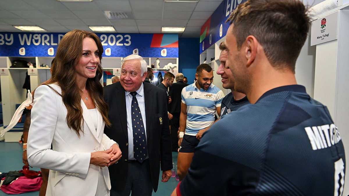 Princess Kate talks to English rugby players