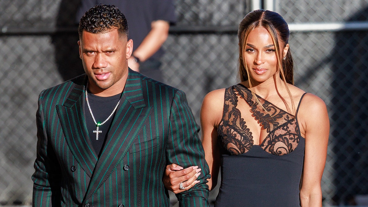 Russell Wilson and Ciara arrive at a TV show