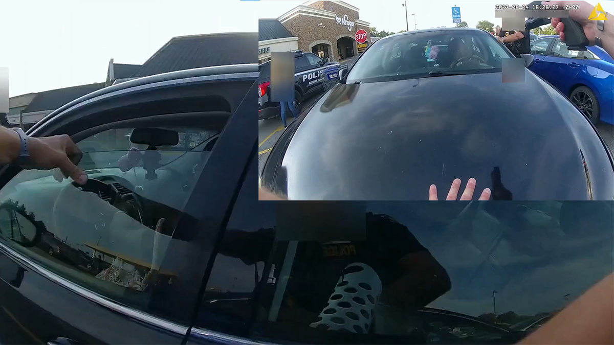 Both officers near the car