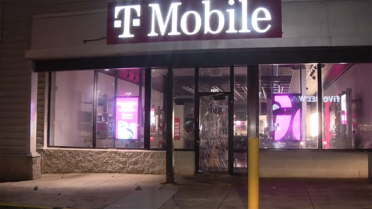 T-Mobile logo, smashed window