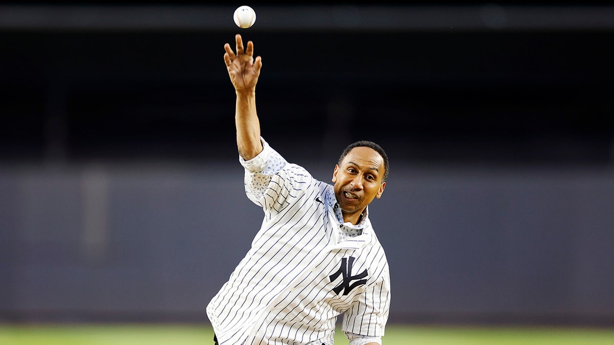 Stephen A. Smith throws ball