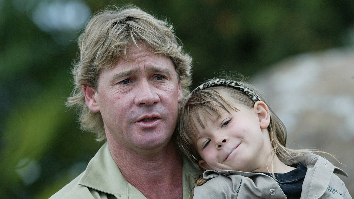 Steve Irwin holding a young Bindi Irwin