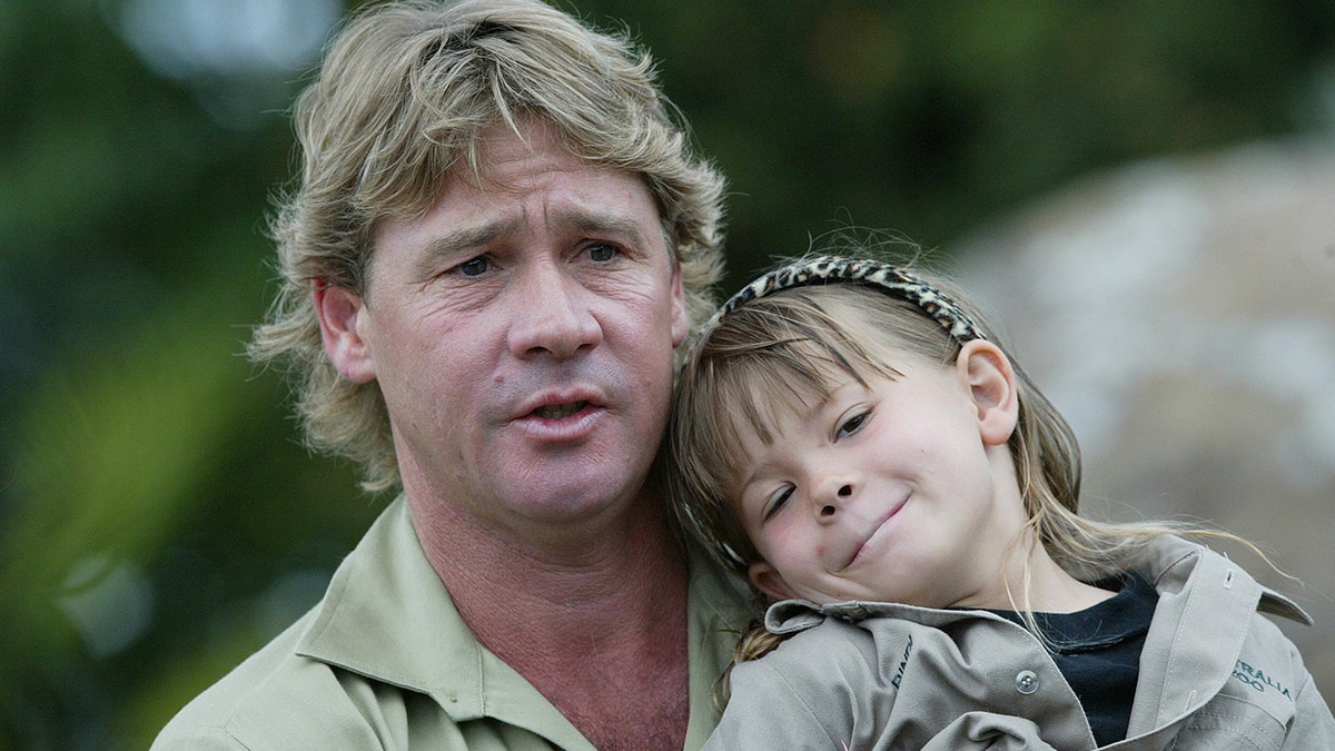 Steve Irwin holding a young Bindi Irwin