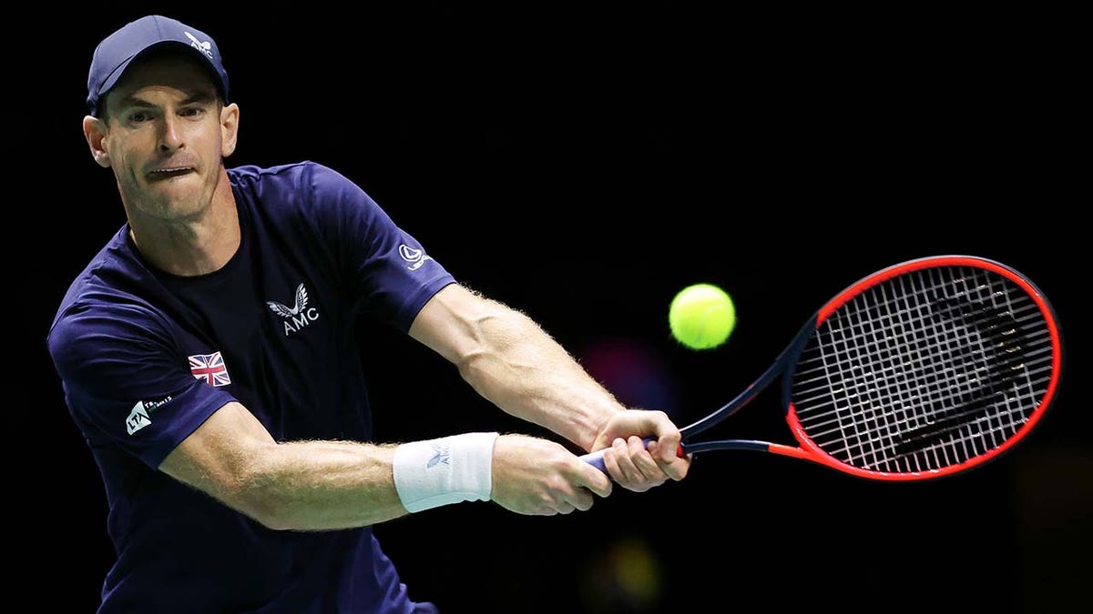 Andy Murray plays a backhand