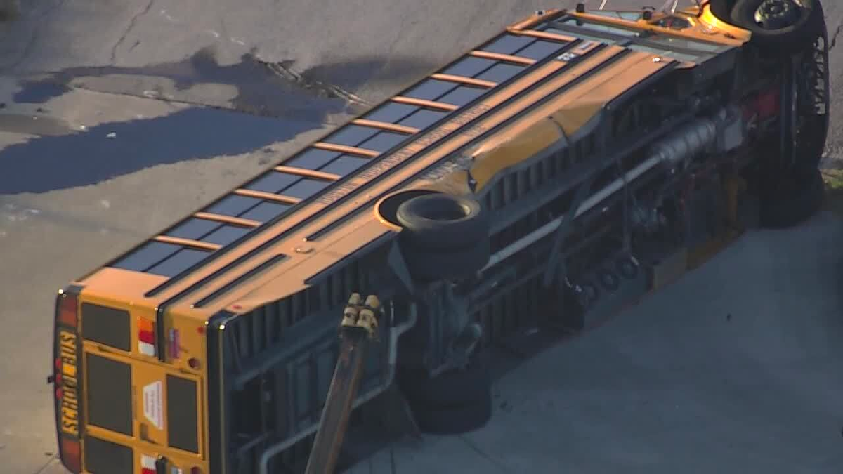 Houston school bus on its side after a crash