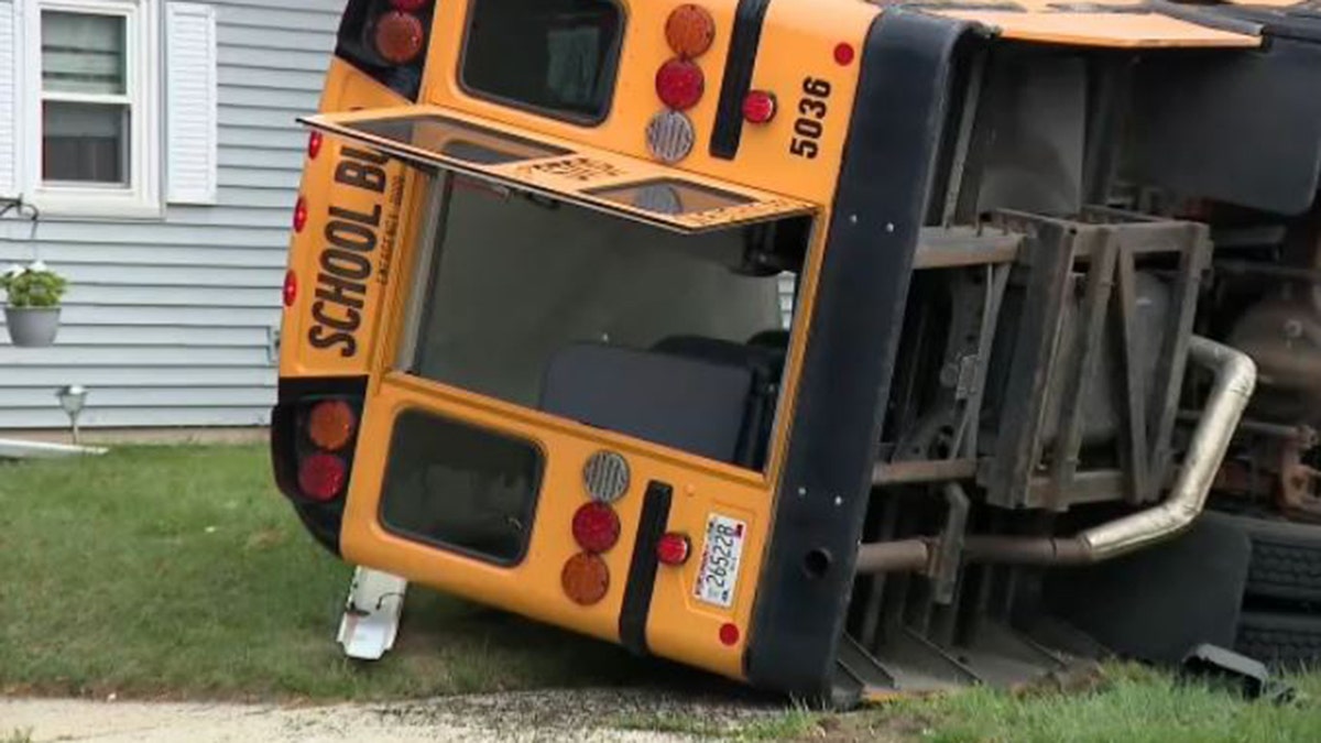 Wisconsin bus seen in a yard after a crash