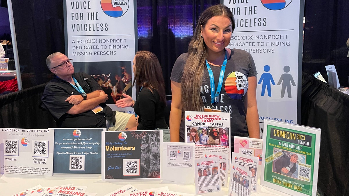 Whitney Sich at her CrimeCon 2023 booth_