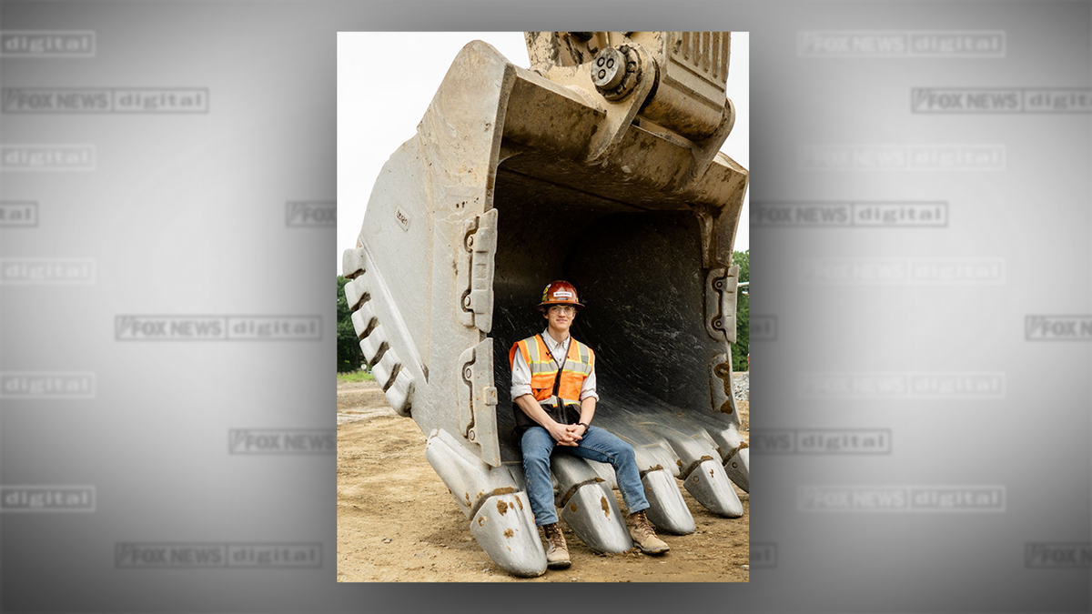 photo of Aaron Witt with excavator