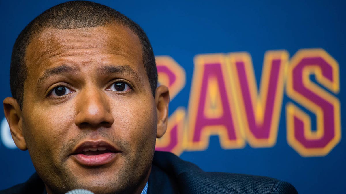 Koby Altman speaks during a press conference