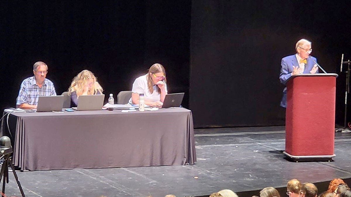 West Virginia University President E. Gordon Gee, right, speaks prior to a vote at a university faculty meeting on Sep. 6, 2023, in Morgantown.