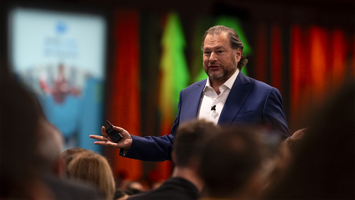 Photos of Marc Benioff speaking on Dreamforce