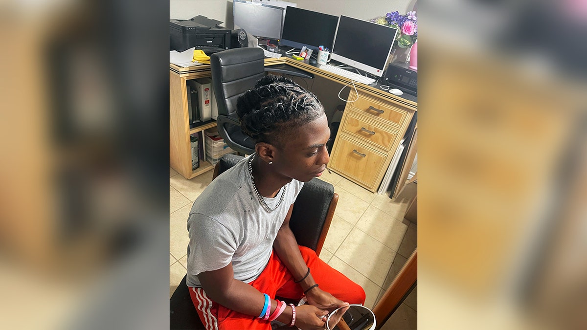 Black student suspended hairdo