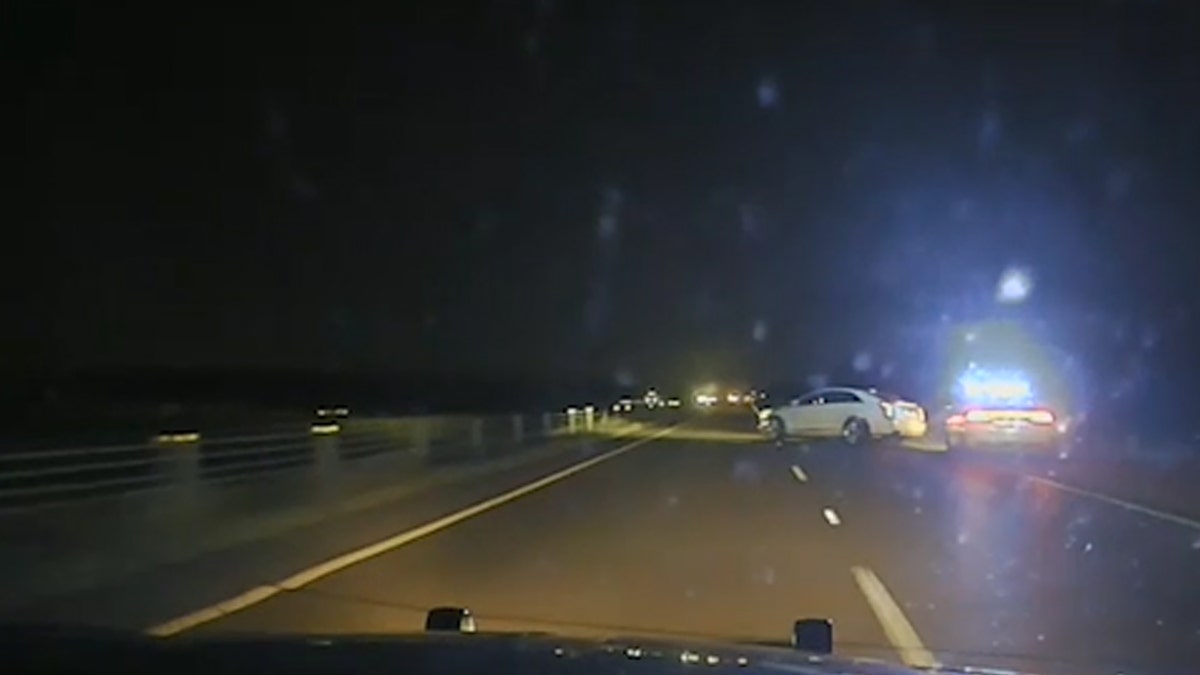 Arkansas Police car dash cam captures another cop car hitting a white car on the highway