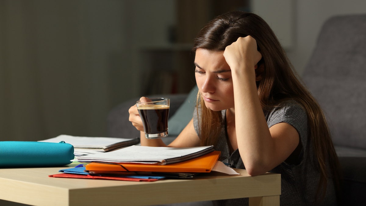 College girl drinking coffee