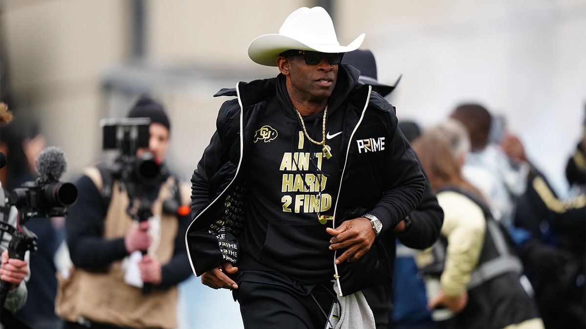 Deion Sanders takes the field