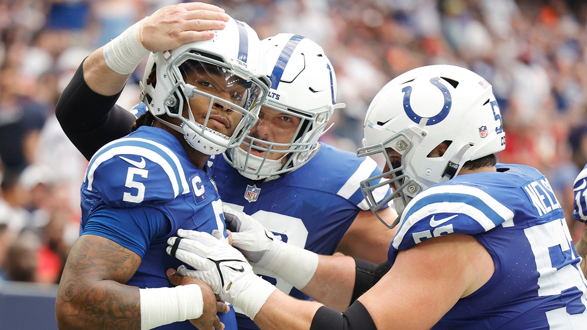 Anthony Richardson celebrates a touchdown