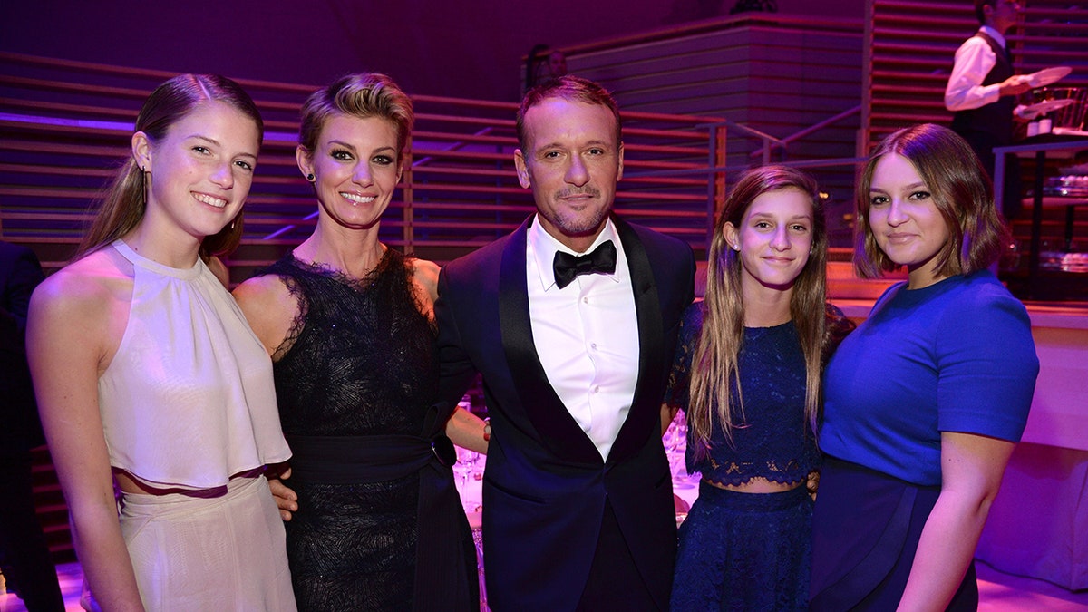 Tim McGraw and Faith Hill with their three daughters