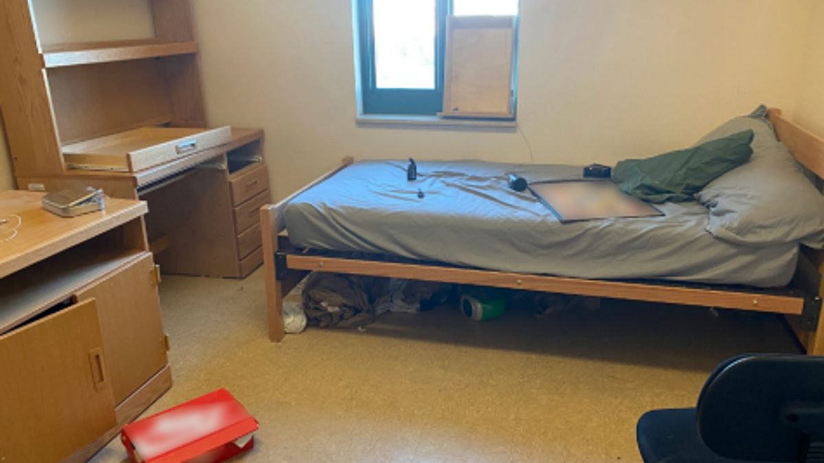 Military barracks bedroom with squatter's possessions