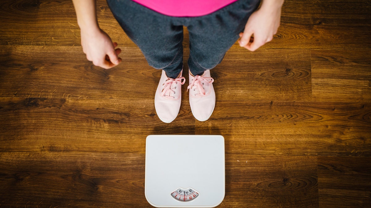 Girl at scale