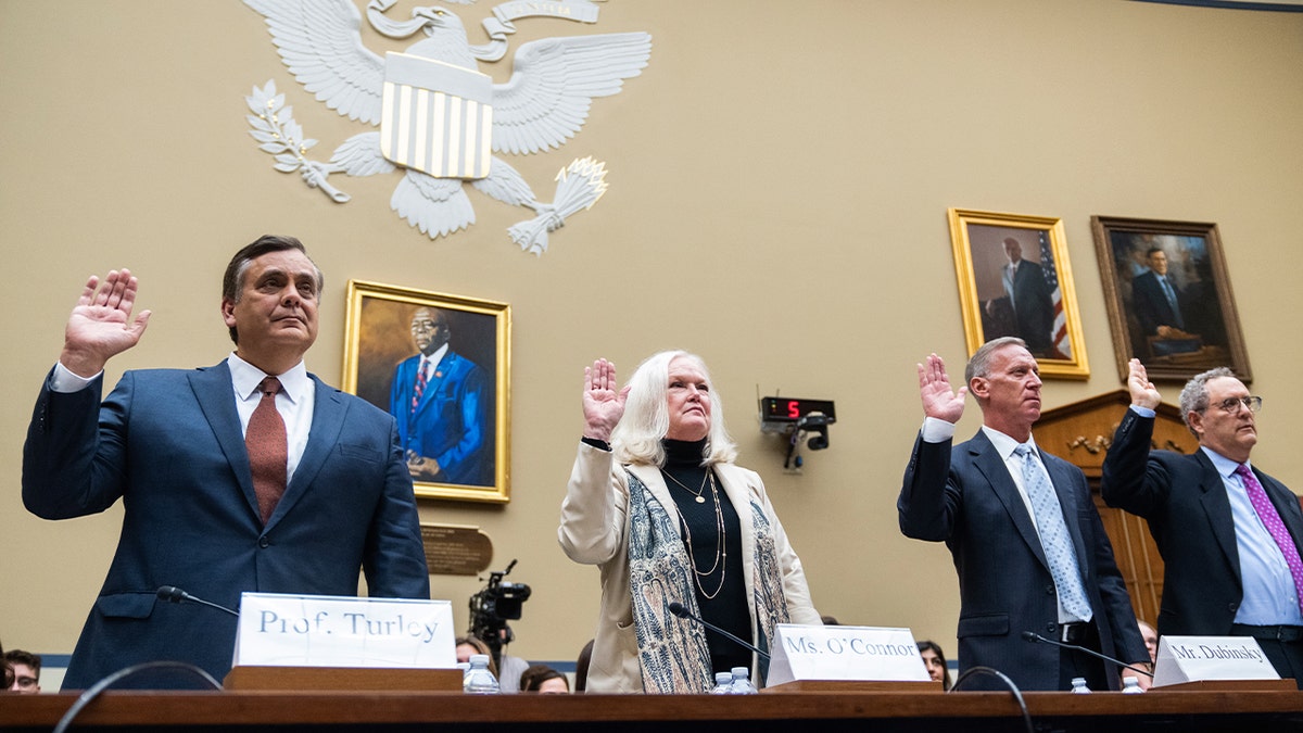rom left, Jonathan Turley, Shapiro Chair for Public Interest Law George Washington University Law School, Eileen O'Connor, former assistant attorney general, Bruce Dubinsky, and Michael J. Gerhardt, Burton Craige Distinguished Professor of Jurisprudence University of North Carolina at Chapel Hill, are sworn in during the House Oversight and Accountability Committee hearing titled "The Basis for an Impeachment Inquiry of President Joseph R. Biden, Jr.," in Rayburn Building on Thursday, September 28, 2023.