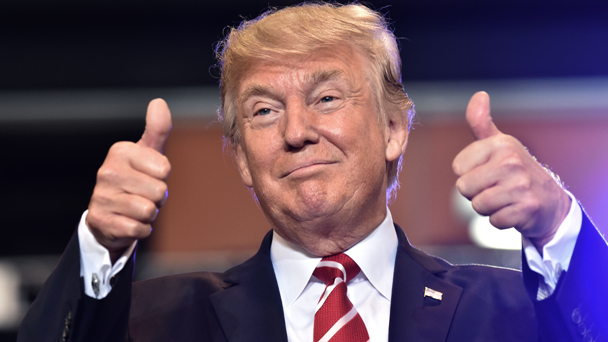 Donald Trump with two thumbs up