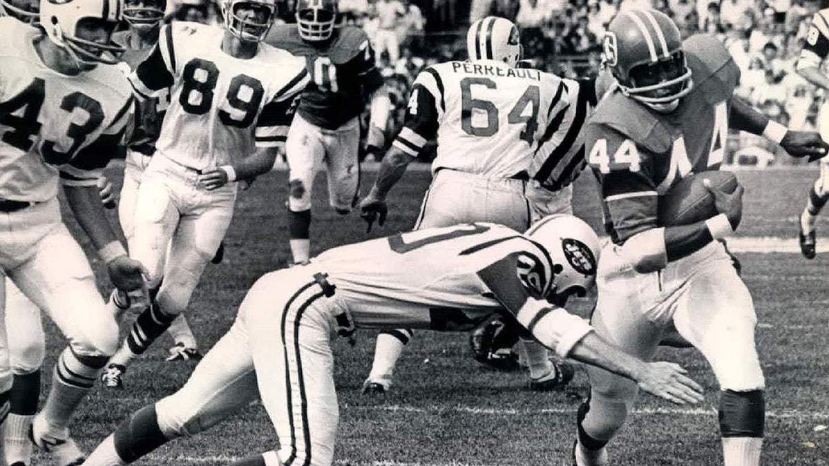 Steve O'Neal goes for a tackle