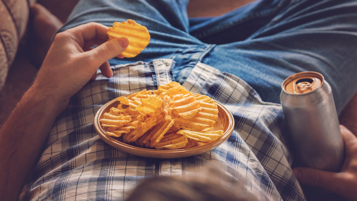 Man eating unhealthy