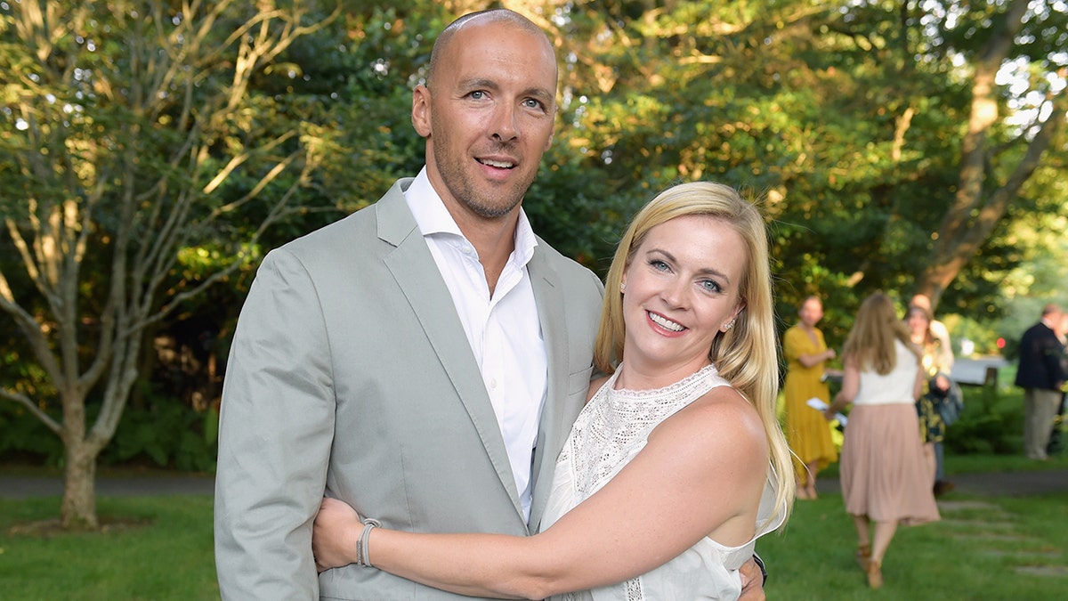 Melissa Joan Hart wraps her arms around husband Mark Wilkerson