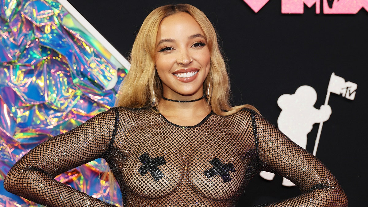 Tinashe Wears Fishnet Bodysuit With Duct Tape at VMAs