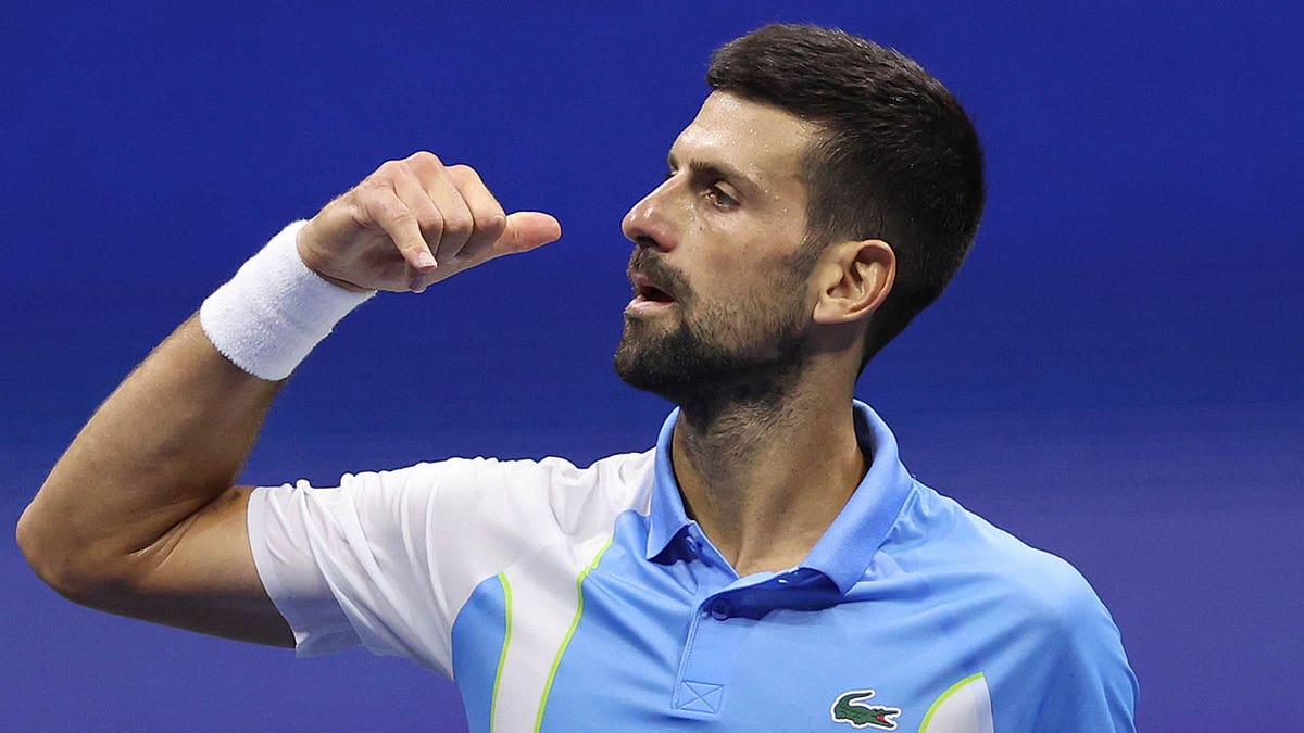 Novak Djokovic celebrates his semi-final victory over Ben Shelton