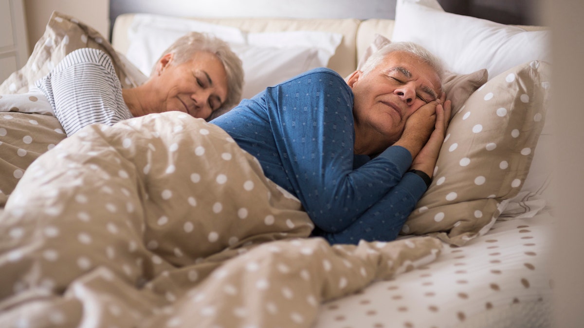 Older couple sleeping