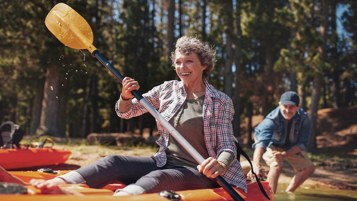 Older woman kayaking