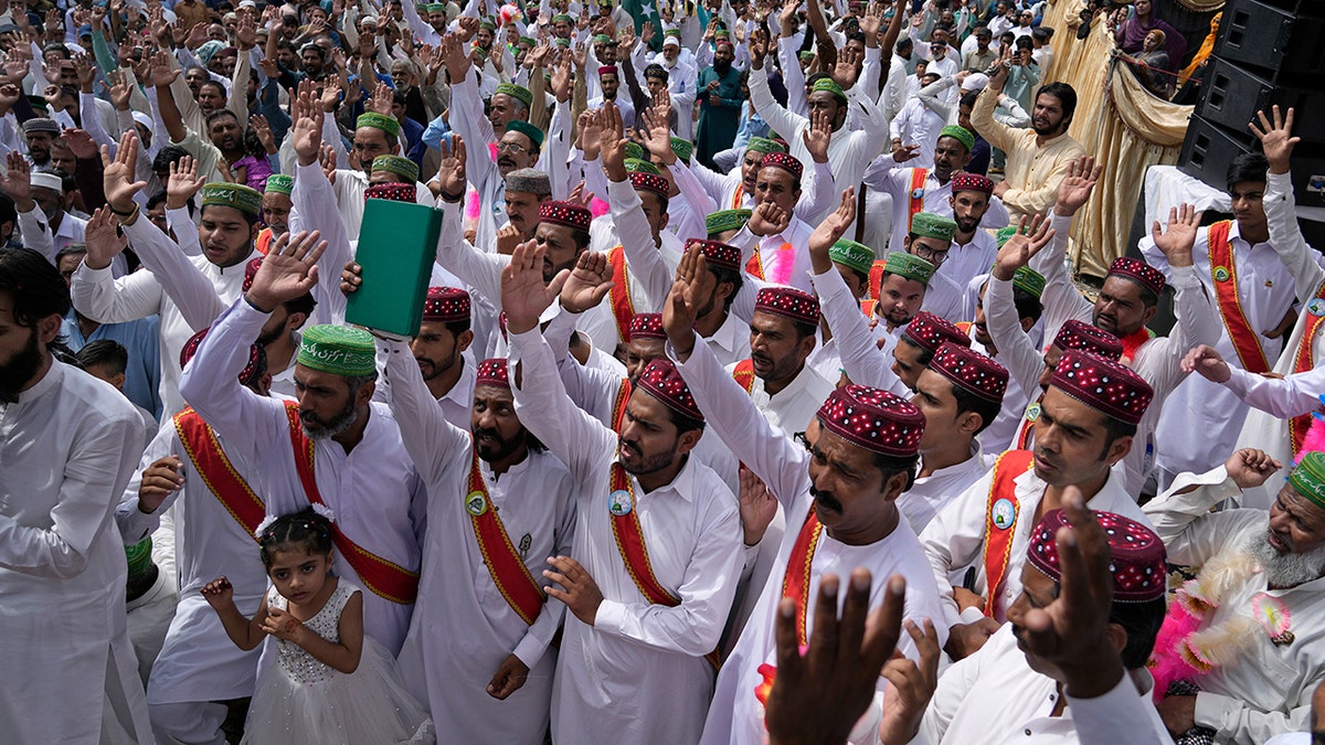 Muslims chant religious slogans during a rally