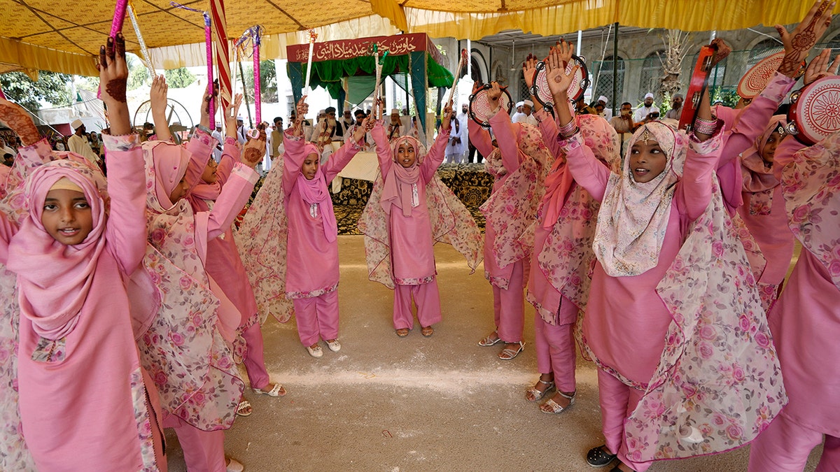 Girls in traditional dress celebrate birthday of Prophet Muhammad