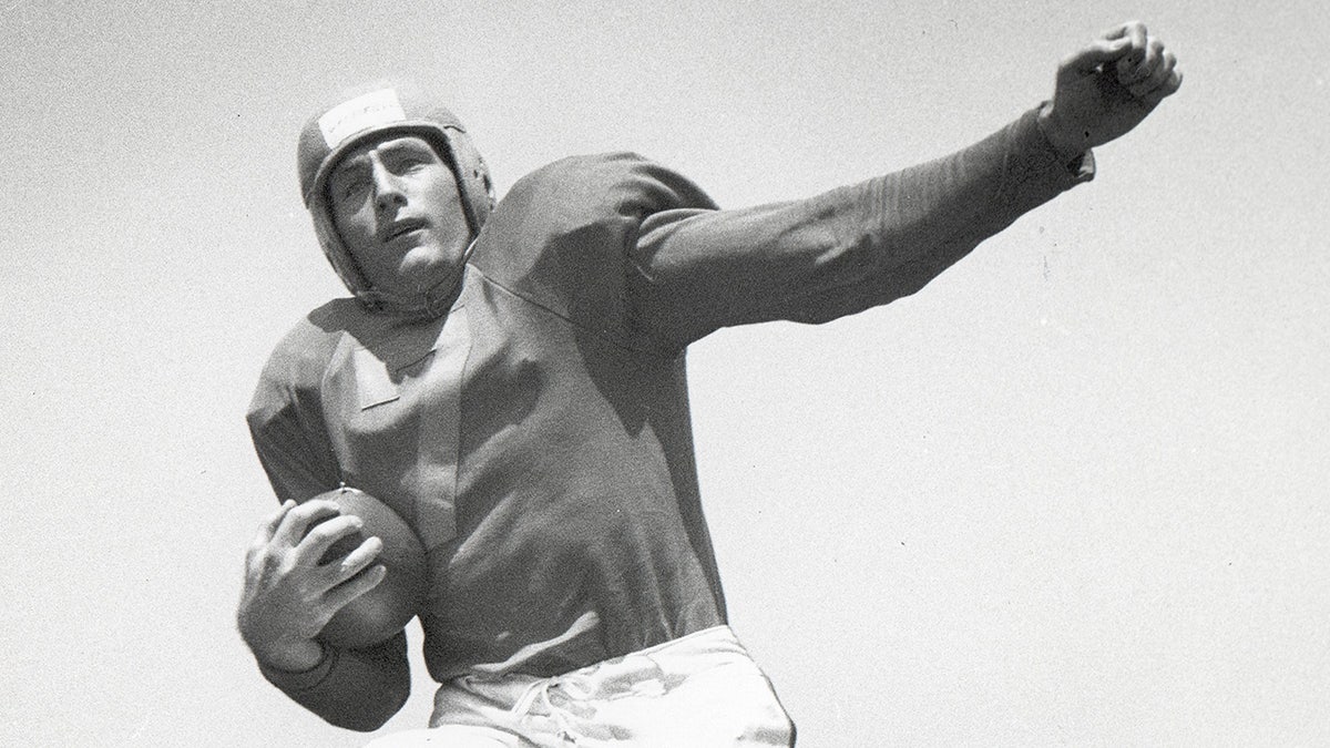 Quarterback Bob Waterfield poses