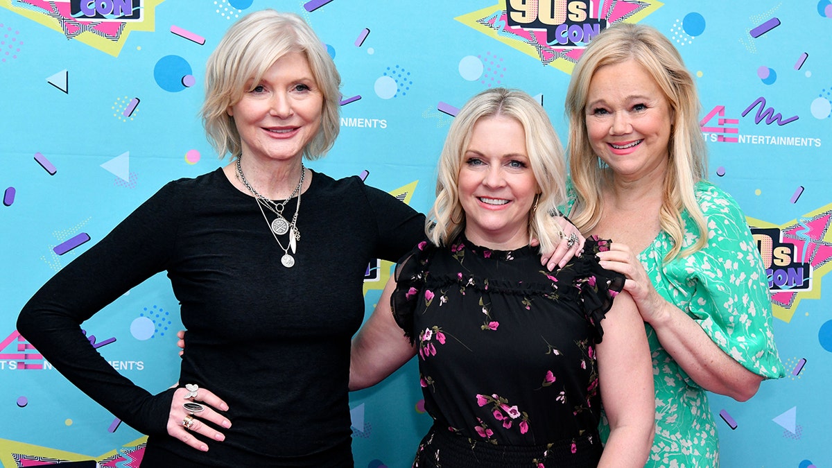 Melissa Joan Hart poses with Sabrina the Teenage Witch co-stars Caroline Rhea and Beth Broderick at 90s Con