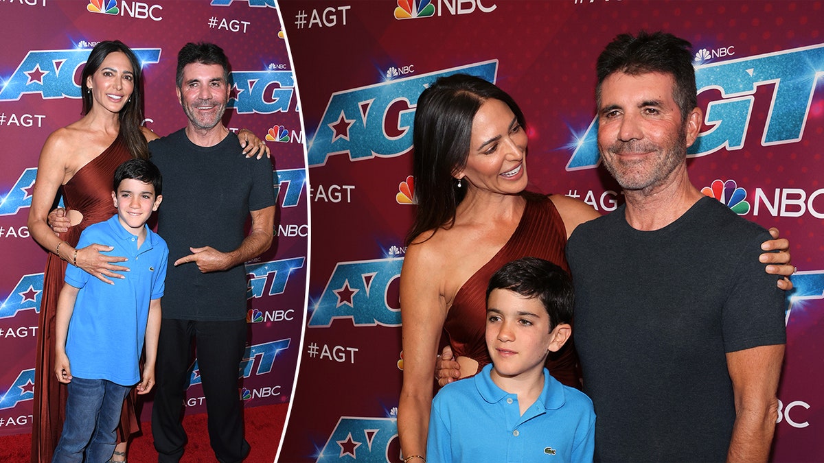 SImon Cowell points to his son Eric on the carpet of AGT who is standing in front of him in a blue shirt and Lauren Silverman has her arm wrapped around him split Lauren looks adoringly at Simon with Eric looking off in a picture from the same event