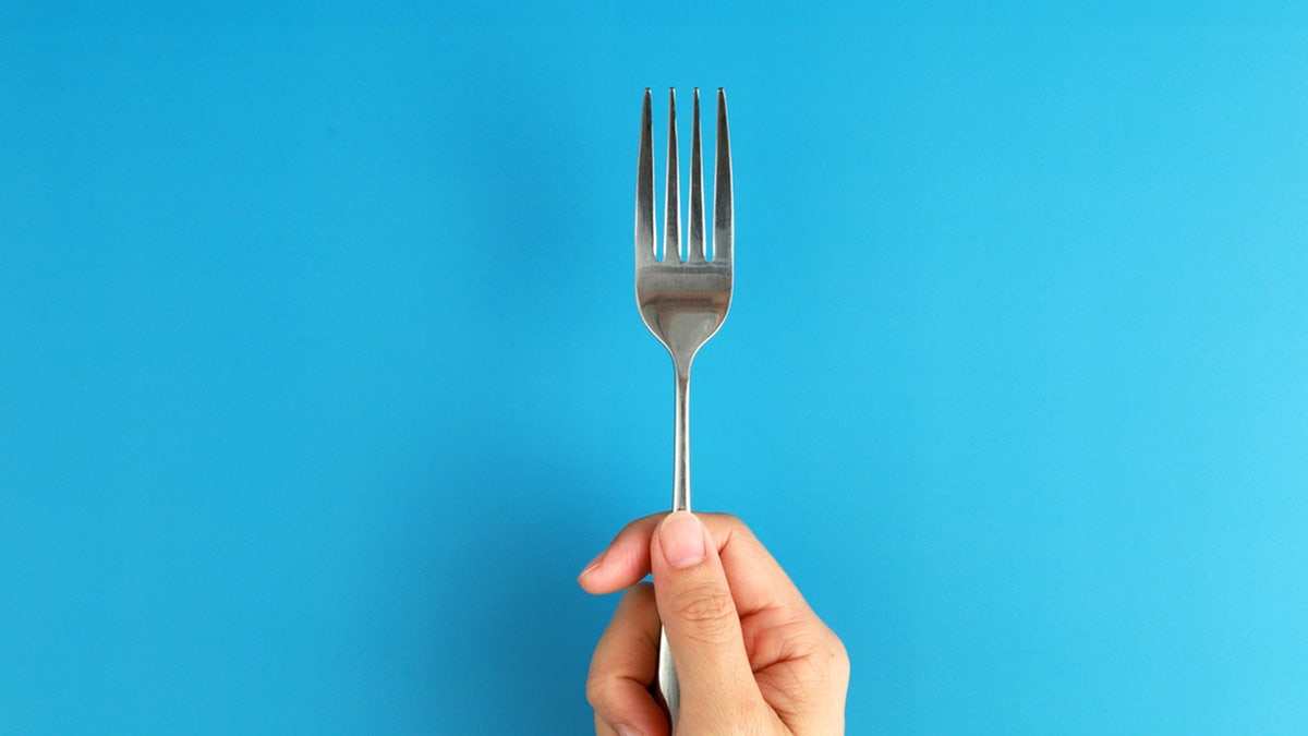 hanging a picture frame with fork hack