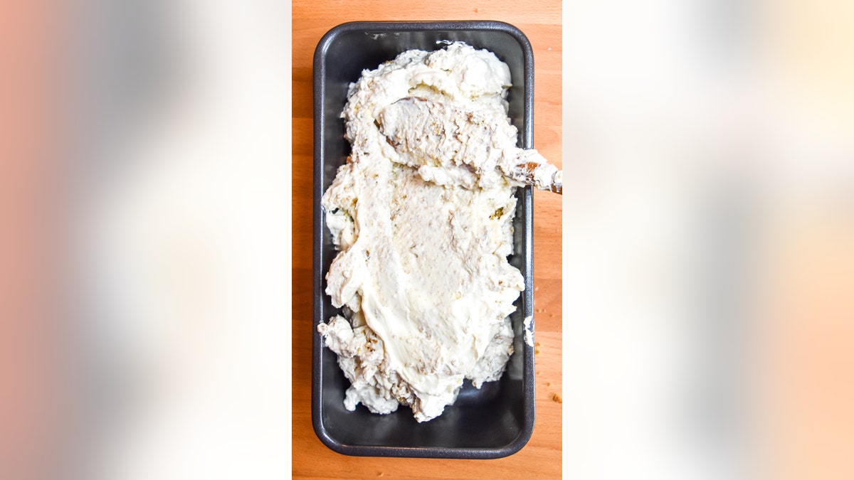 spreading ice cream in tray