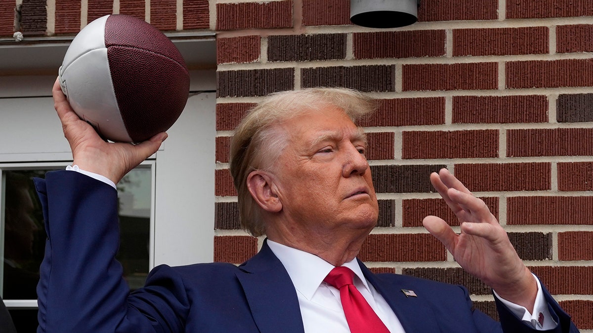 Trump Flips Burgers And Tailgates Before College Football Game, Crowd ...