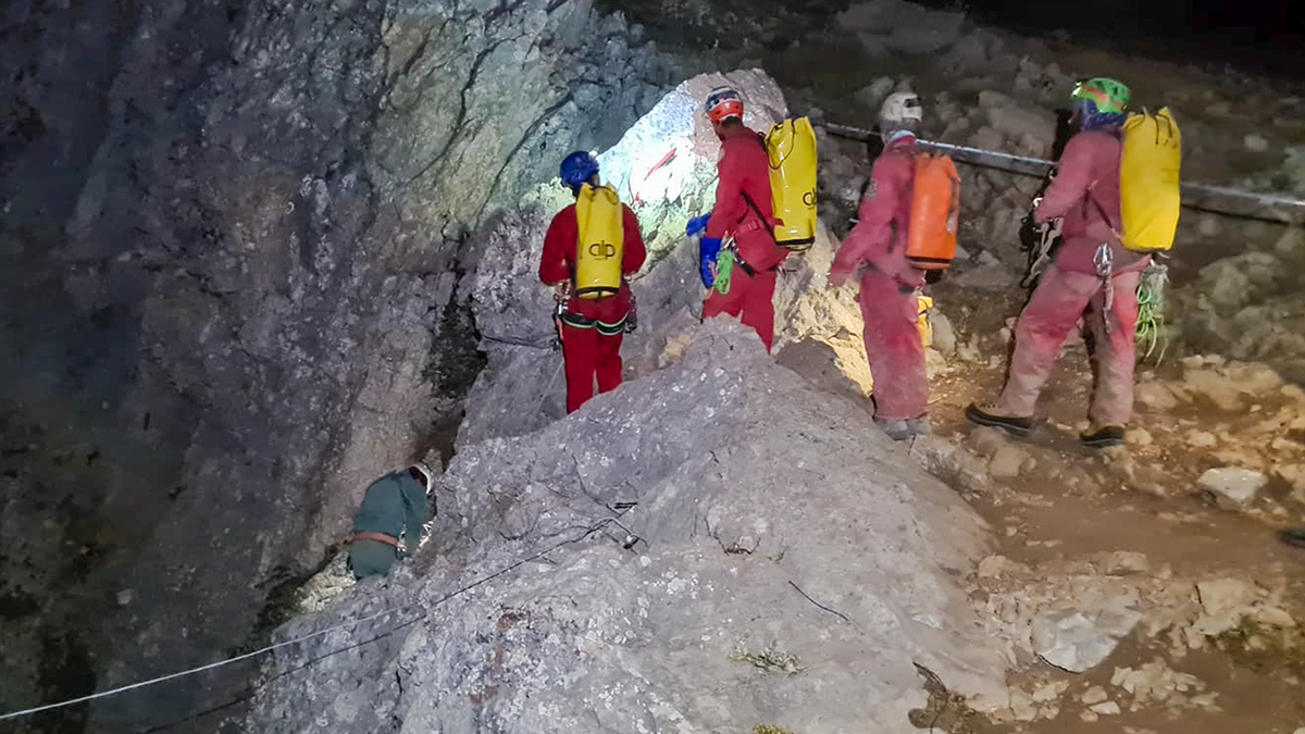 Members of the CNSAS, Italian alpine and speleological rescuers