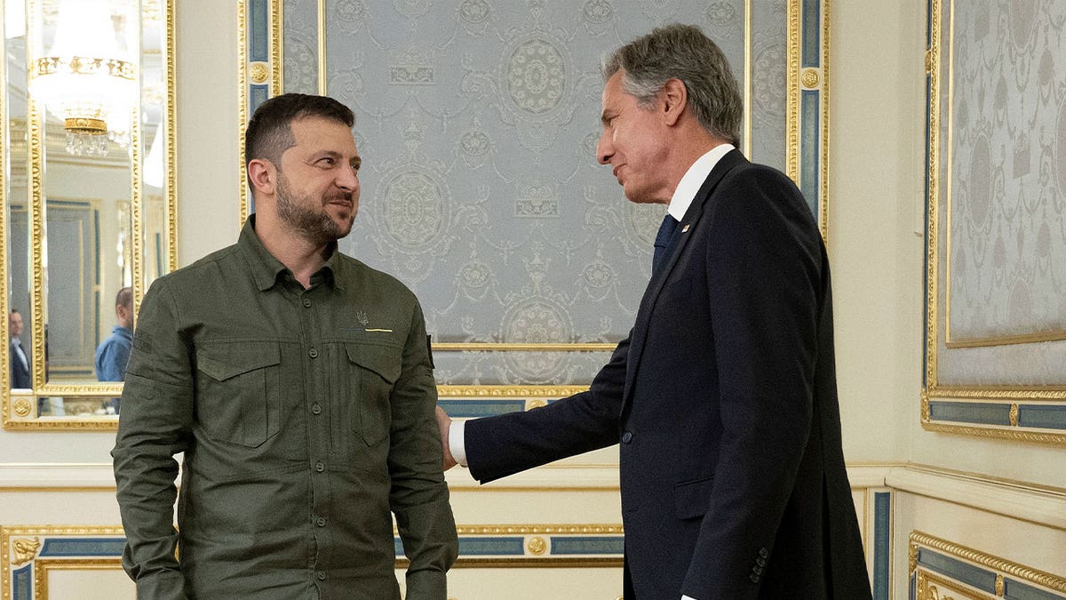 Ukraine's President Volodymyr Zelenskyy greets U.S. Secretary of State Antony Blinken