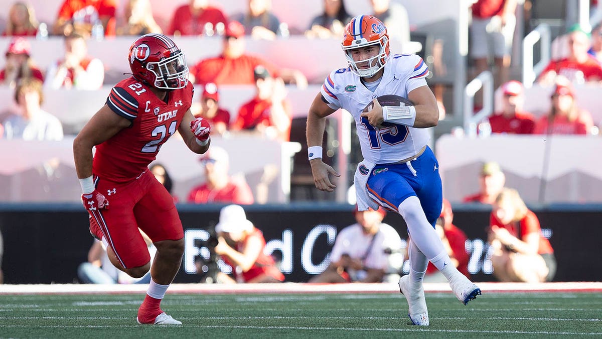 Florida's Graham Mertz runs the ball