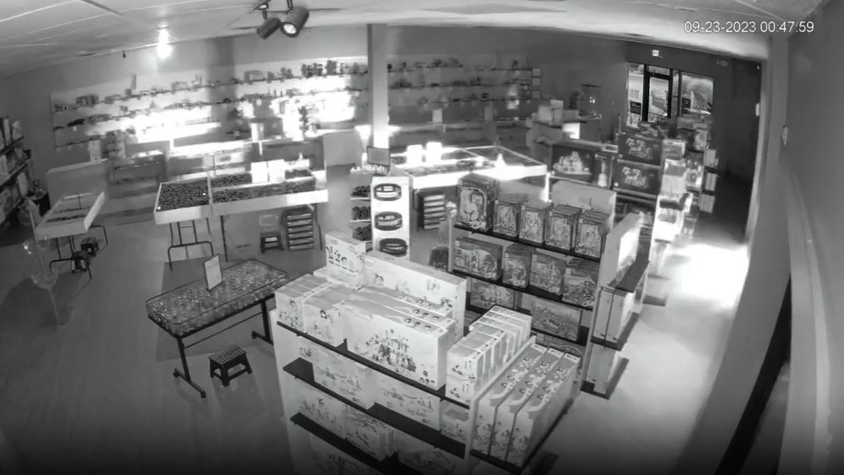 Headlights peek into store before crash